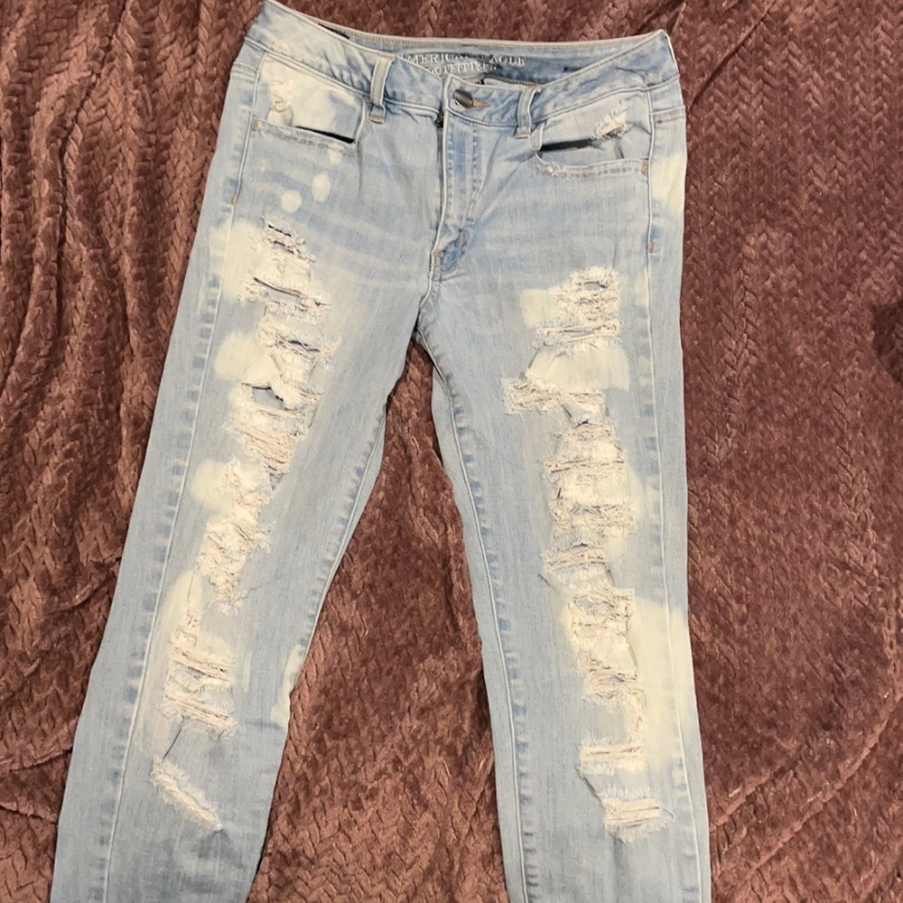 AMERICAN EAGLE mid rise distressed acid wash jeans